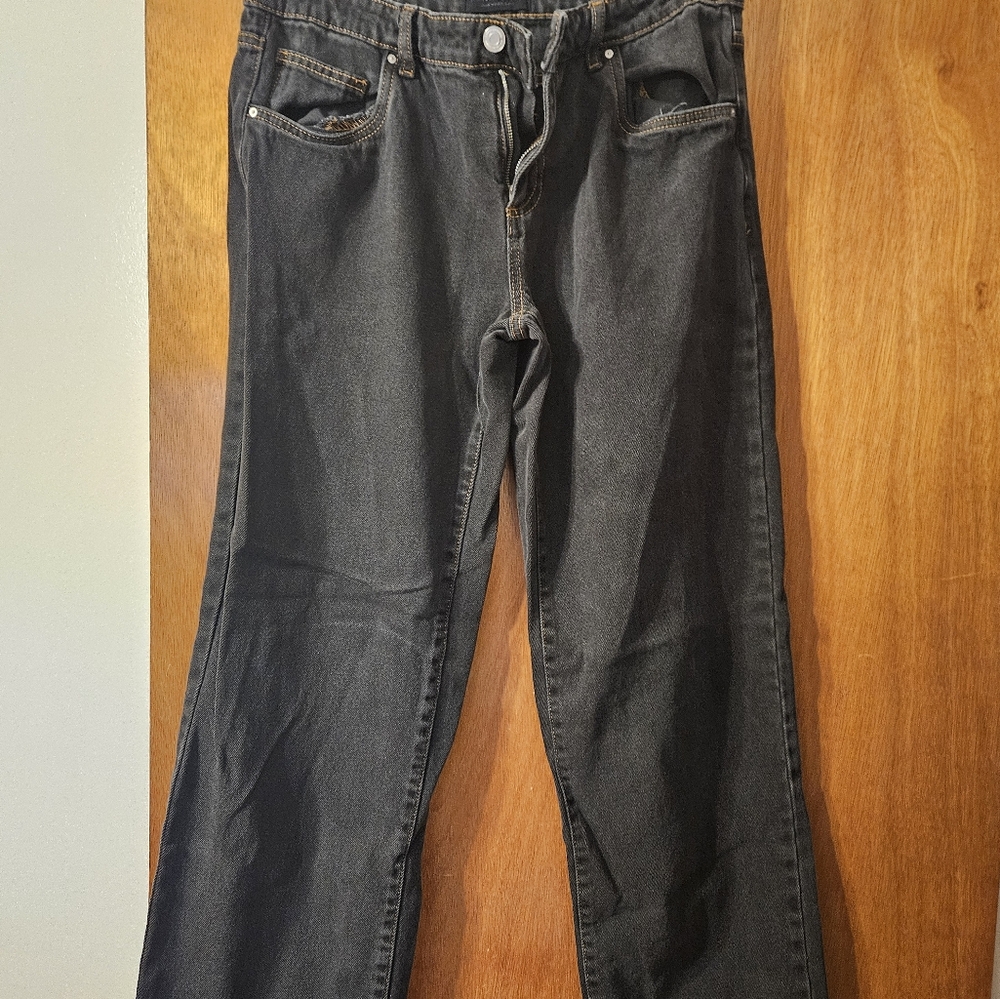 Black jeans with tan stitching